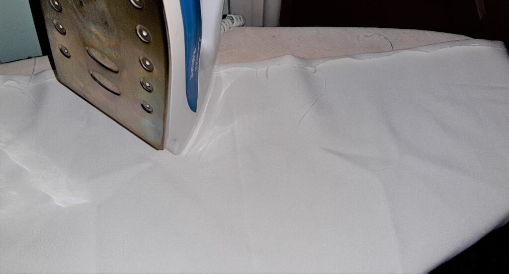 Ironing the cloth for easyer hemming