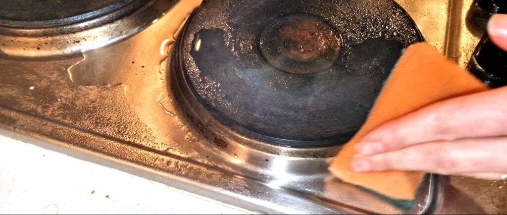 Use the rough side of the sponge